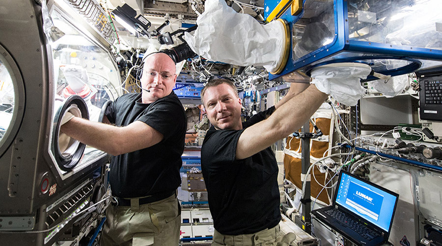 Expedition 43 Commander Terry Virts and Flight Engineer Scott Kelly perform operations for Rodent Research 2, a commercial investigation of the effects of spaceflight on the musculoskeletal and nervous systems that was launched to the station on April 14, 2015.